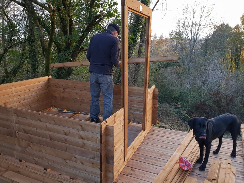 Lillie helping to build the shed