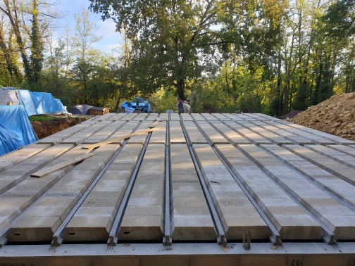 Metal rods and concrete bricks