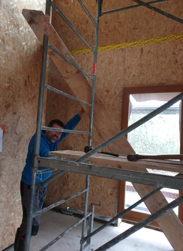 Martin holding the stair case.jpg